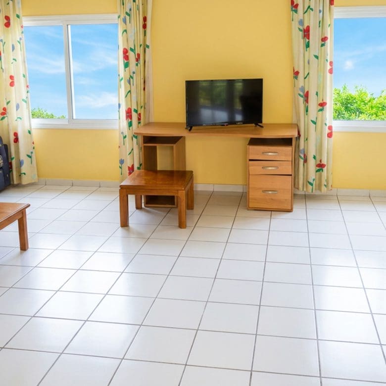 Courtyard walkway with garden area at hotel property in Limi, Evia