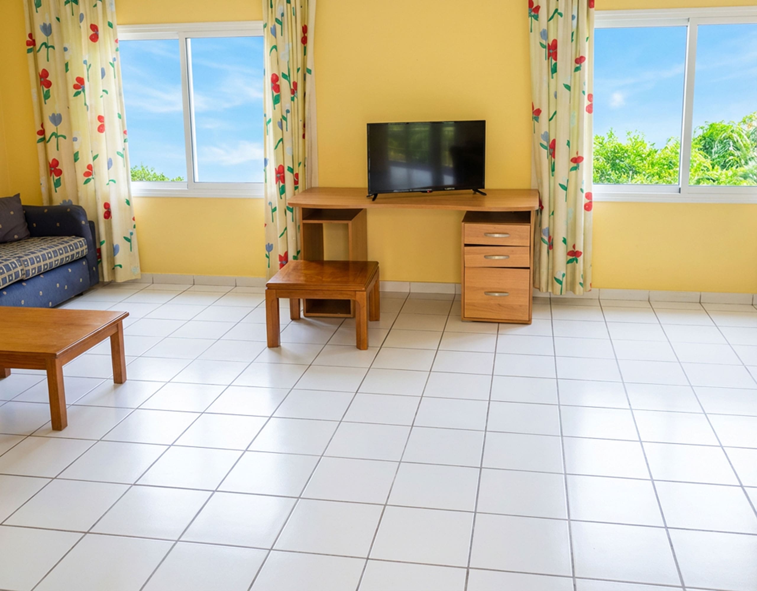 Courtyard walkway with garden area at hotel property in Limi, Evia