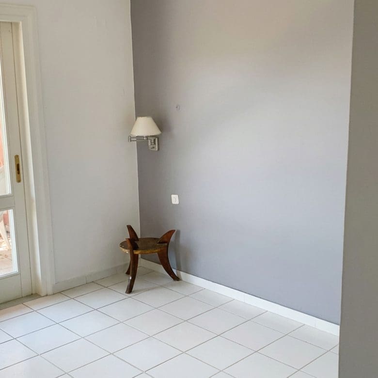 Guest room interior with veranda at hotel property in Limi, Evia