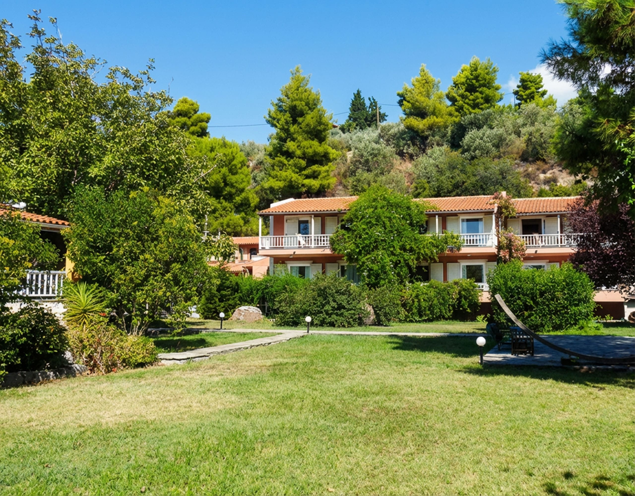 Landscaped garden area at hotel property in Limi, Evia