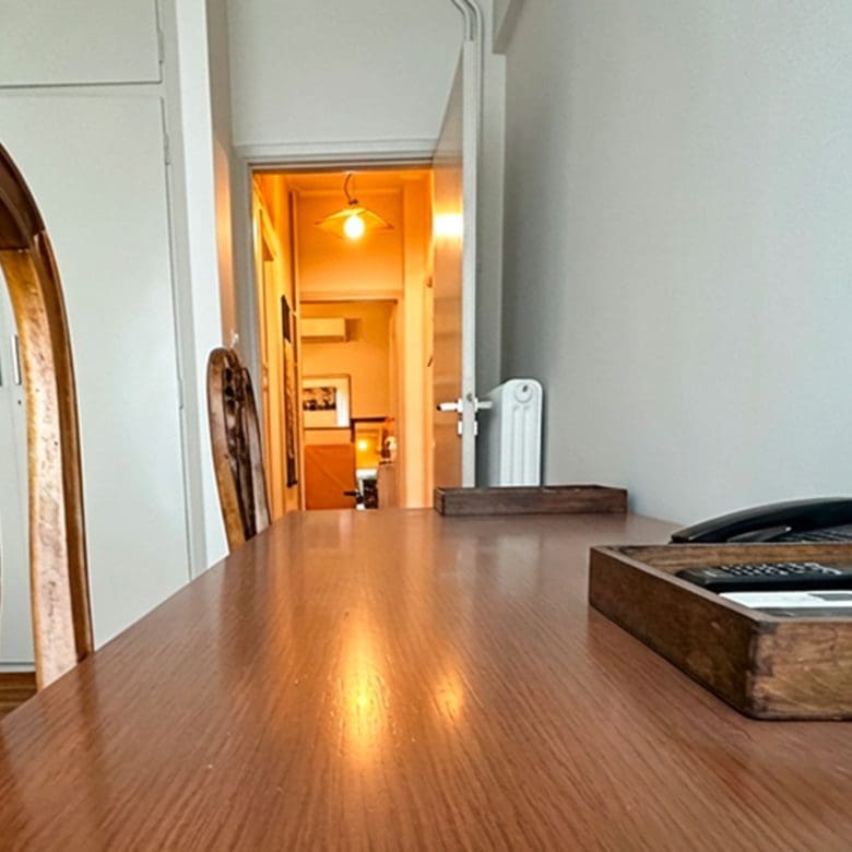 Home office or study area with desk and built-in wardrobes in Ampelokipoi renovated apartment
