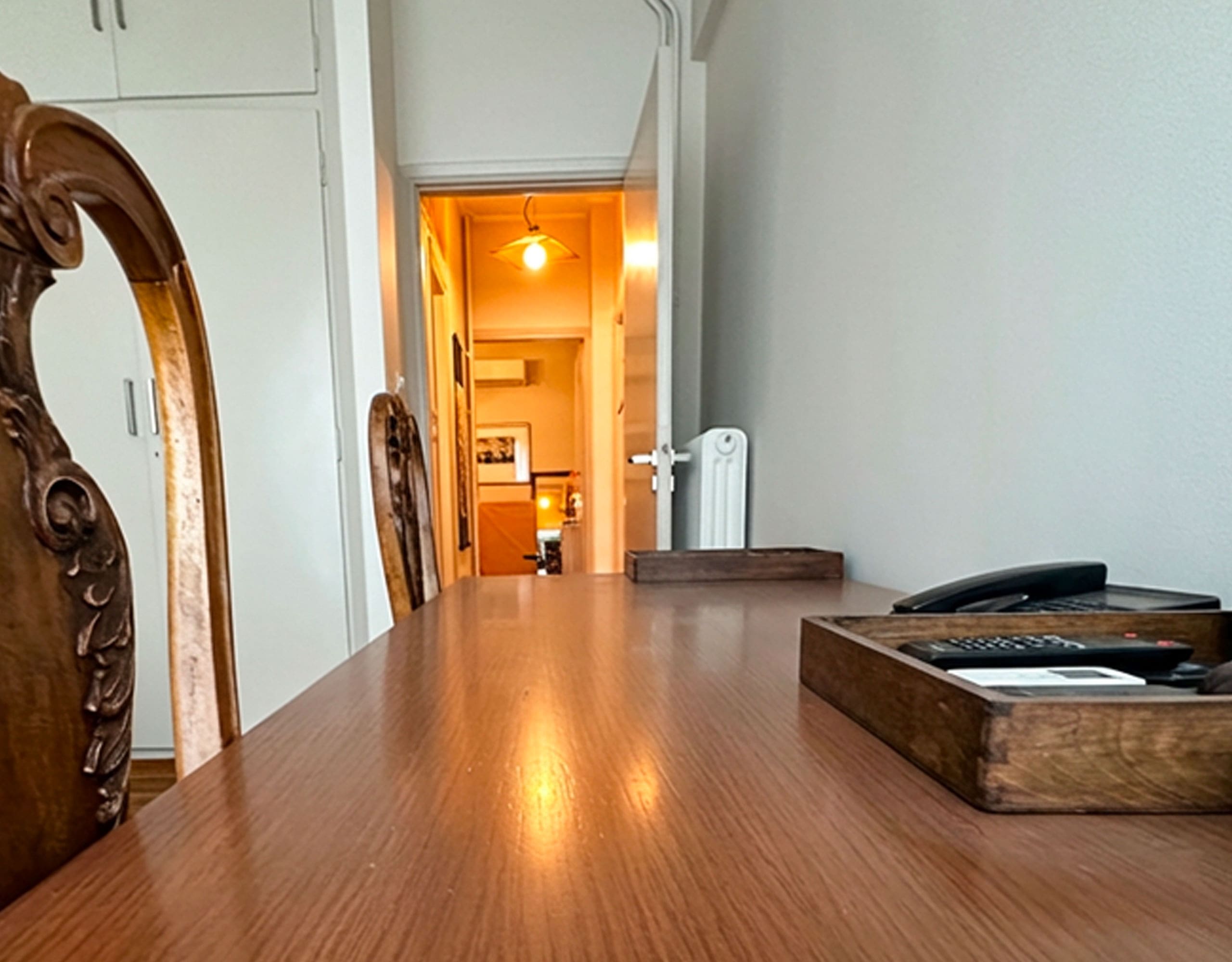 Home office or study area with desk and built-in wardrobes in Ampelokipoi renovated apartment