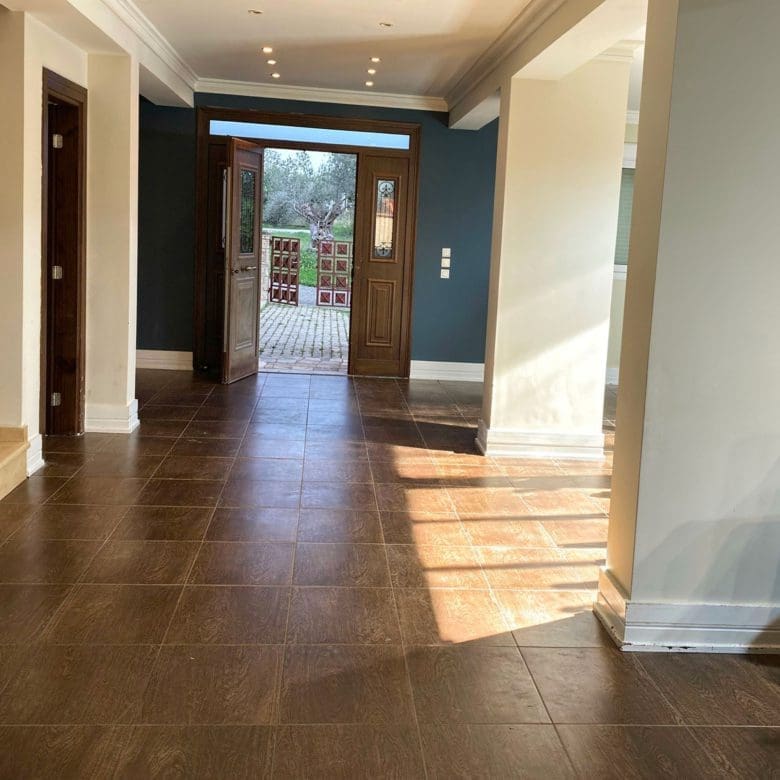 Interior hallway connecting rooms on the ground floor of the Eretria maisonette