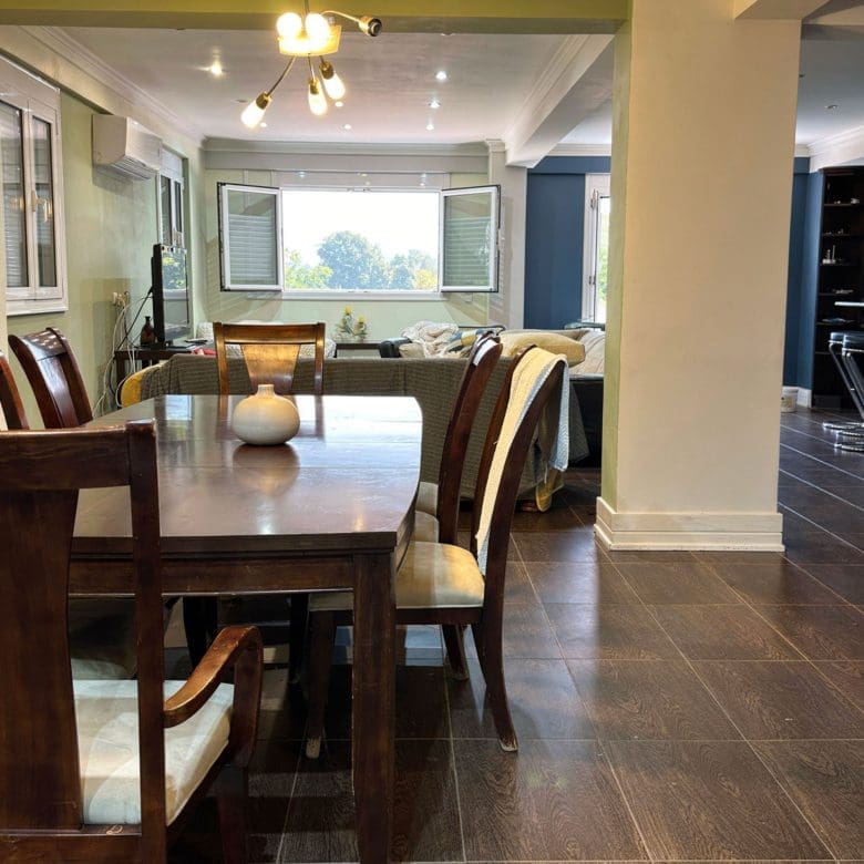 Dining area within the open-plan ground floor of the Eretria maisonette