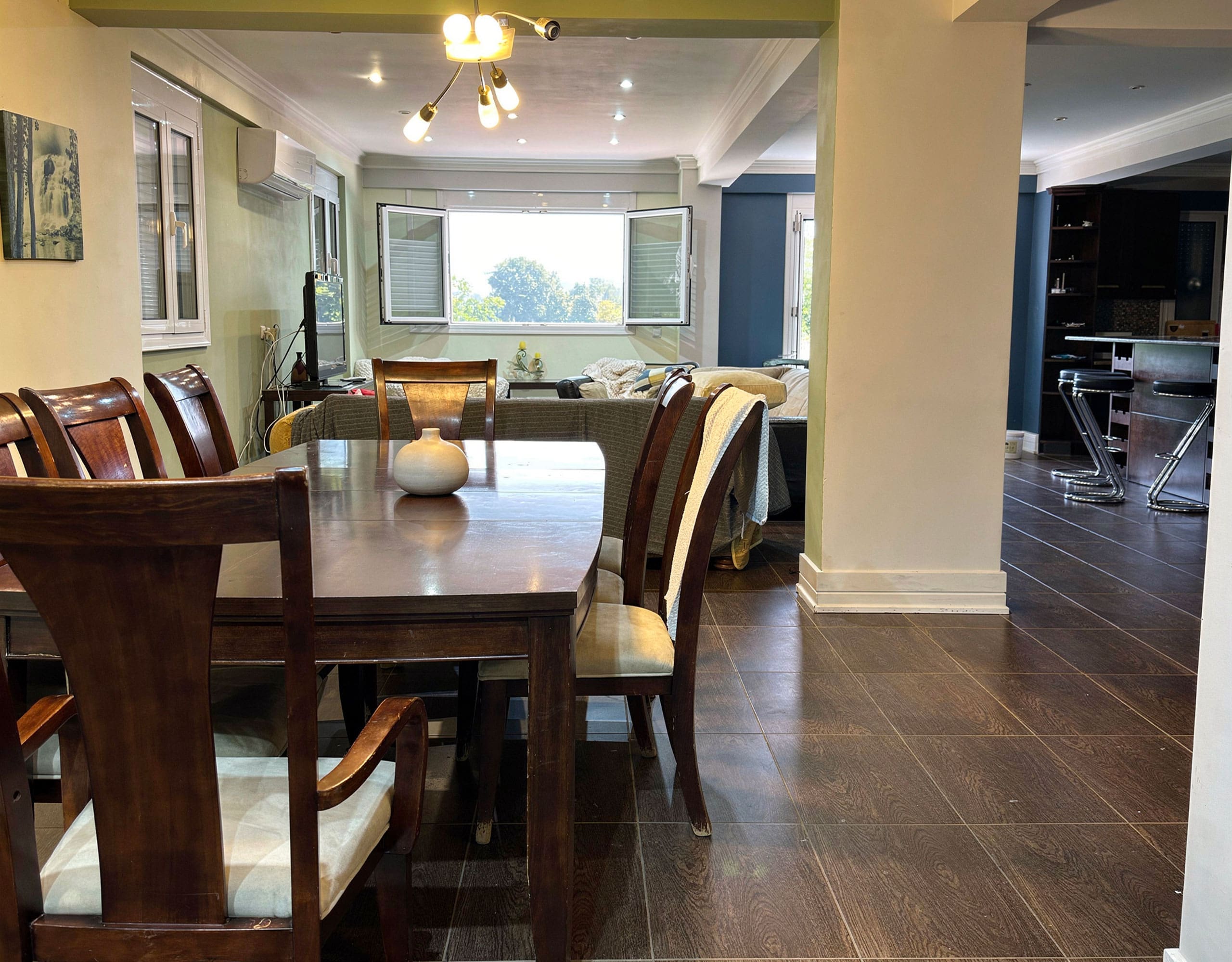 Dining area within the open-plan ground floor of the Eretria maisonette