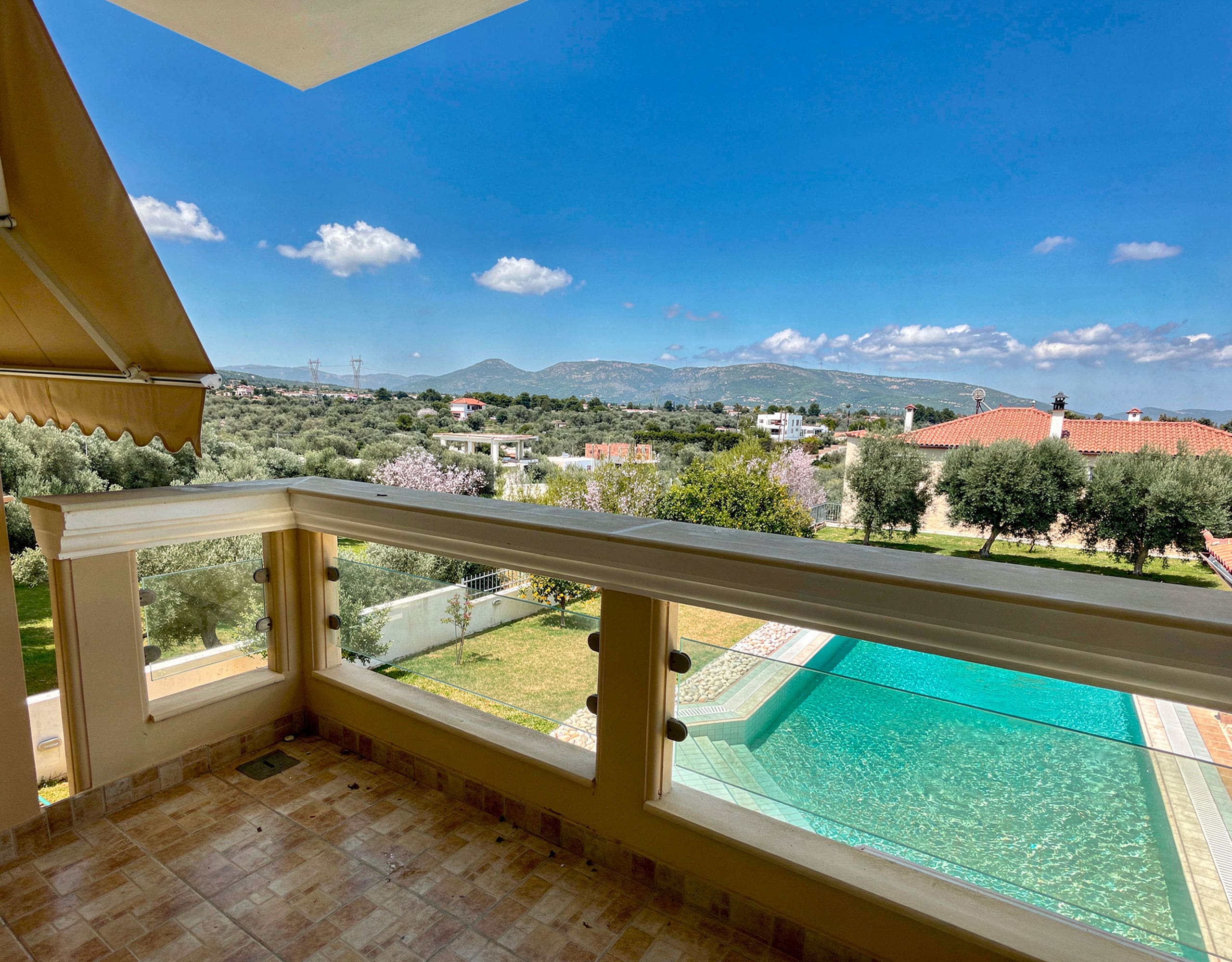 Terrace view over the private pool with sea views in Eretria, Evia