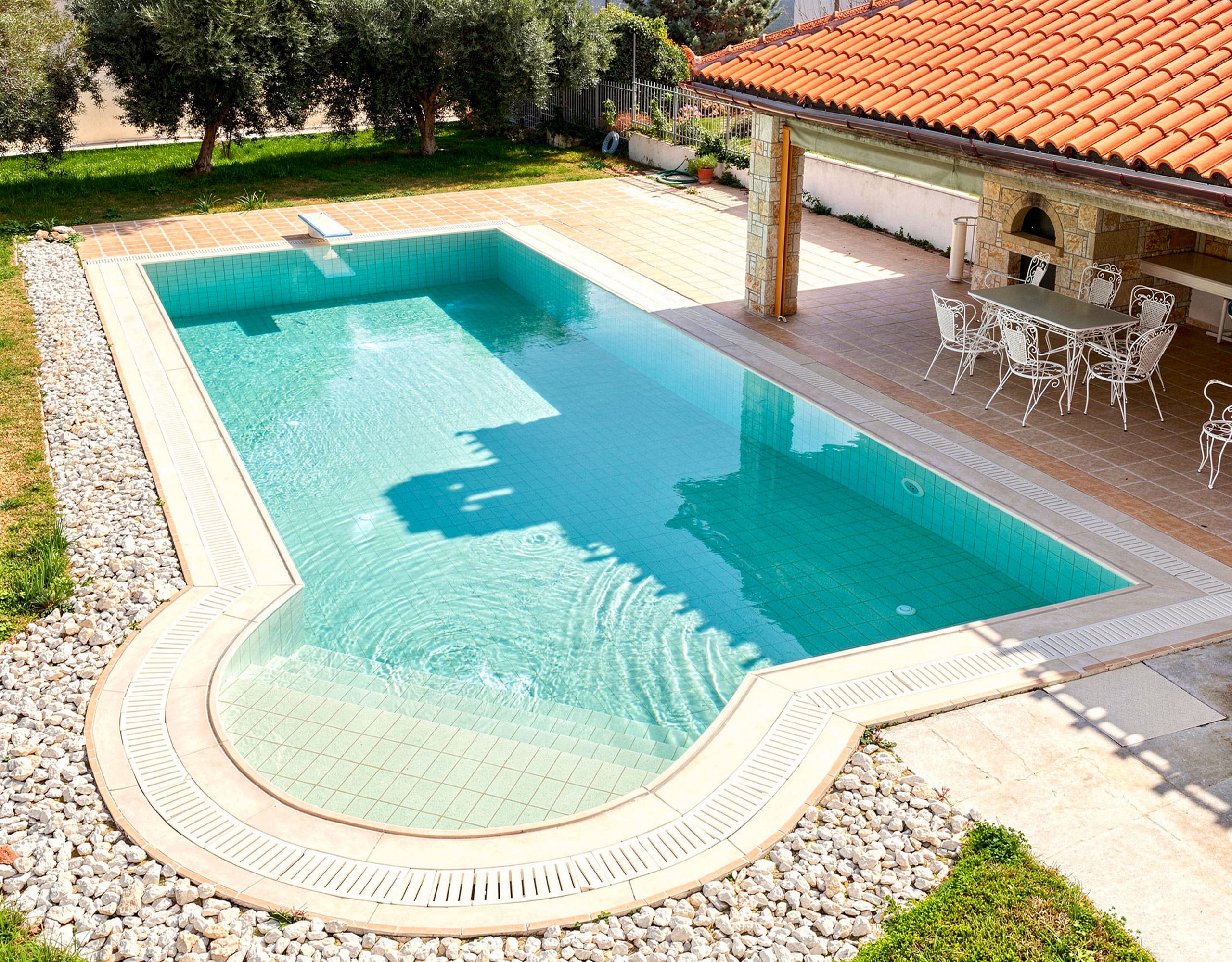 rivate swimming pool area with pergola at the detached maisonette in Eretria
