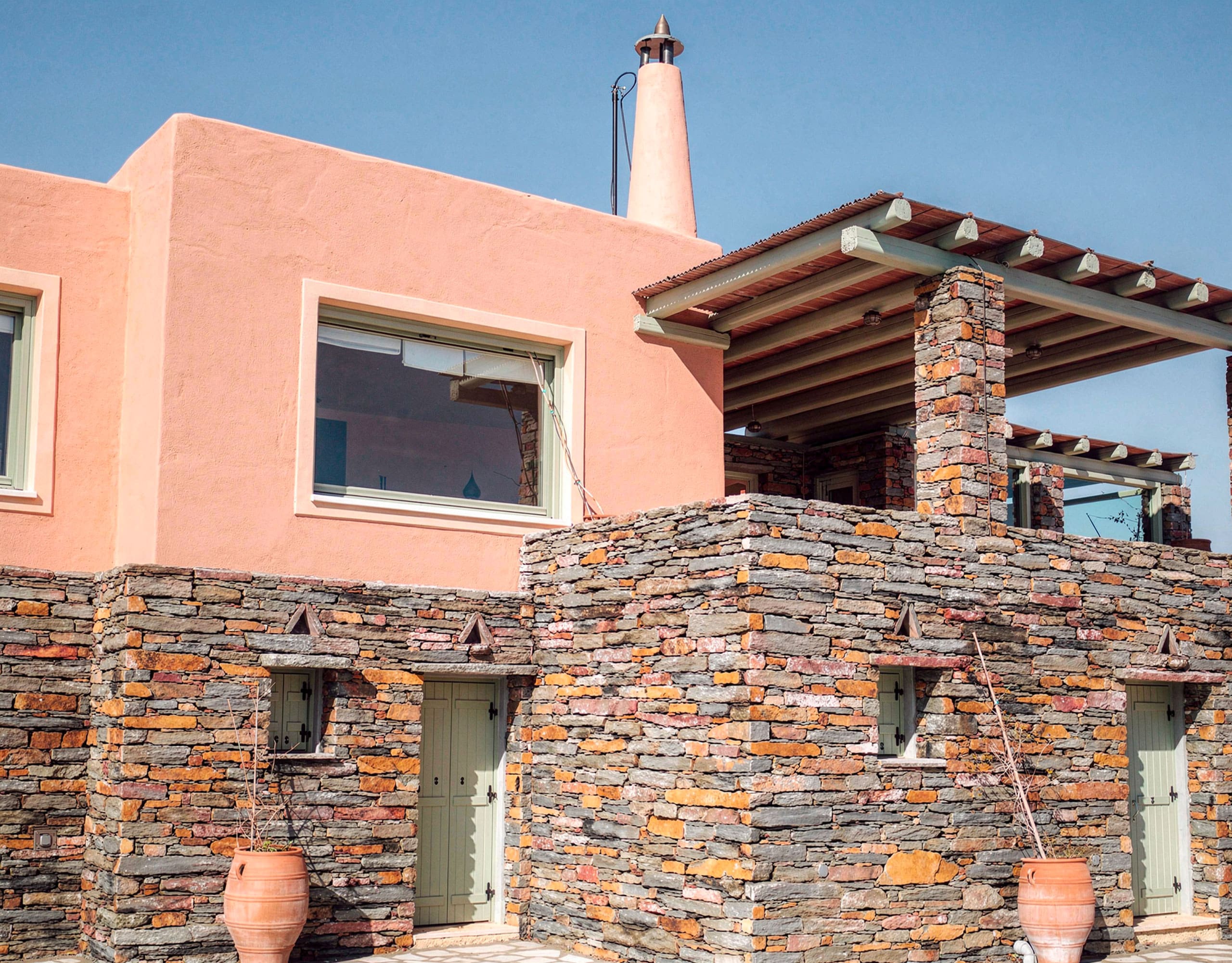 Stone-clad exterior wall detail of Kea (Tzia) maisonette