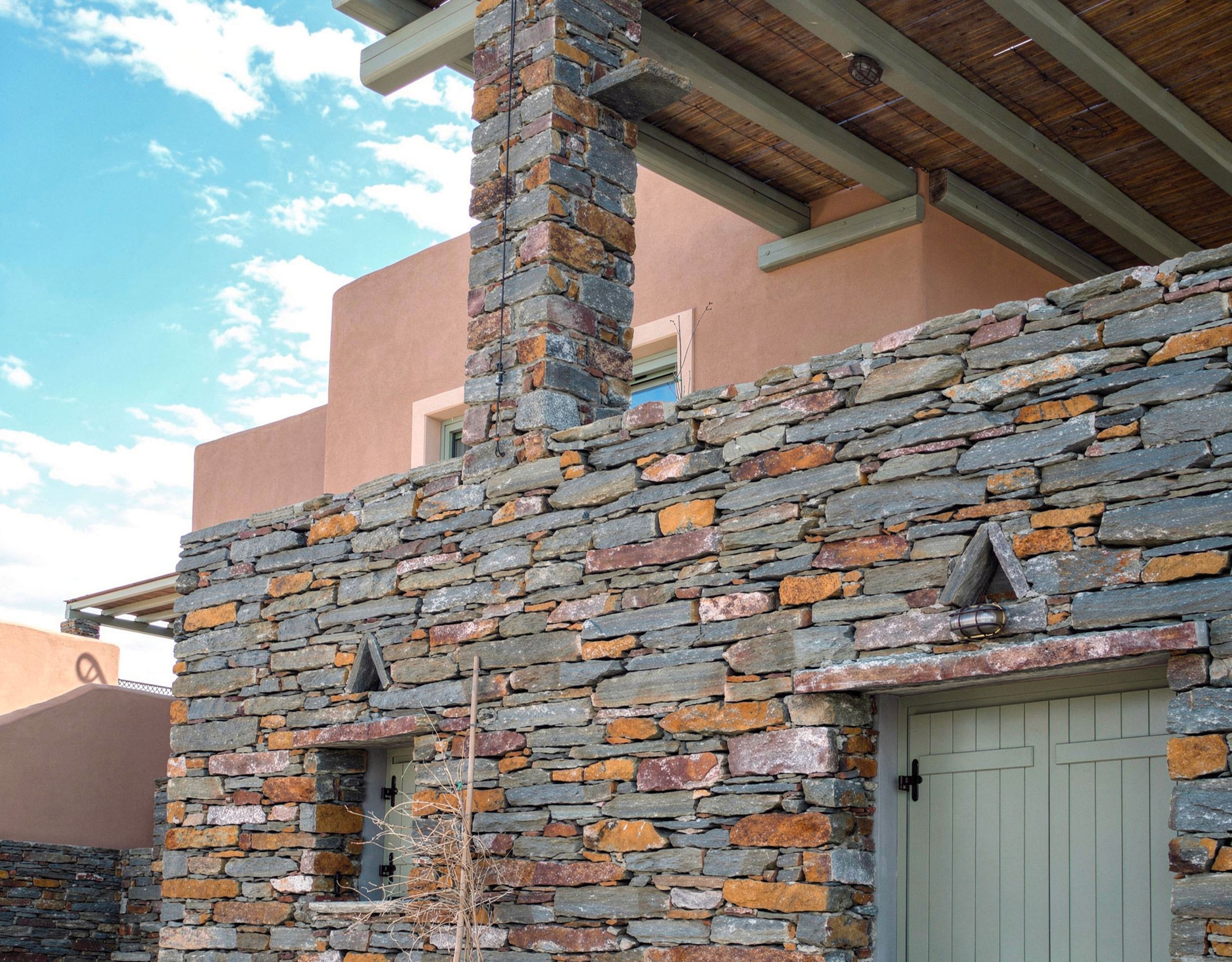 Stone terrace and pergola area at Kea (Tzia) maisonette