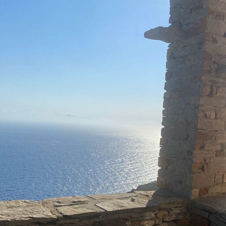 Aegean sea view framed by stone architecture in Kea (Tzia)