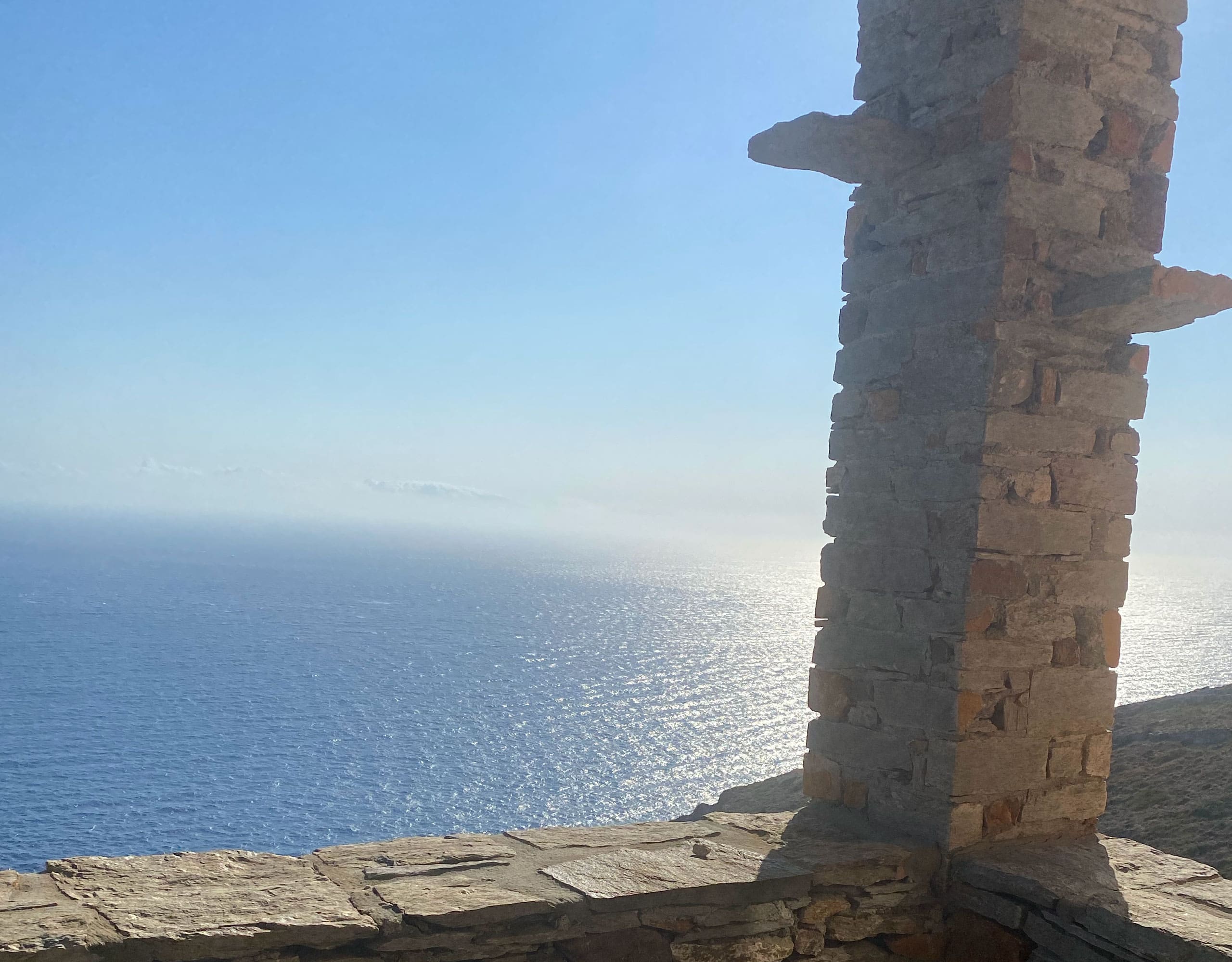 Aegean sea view framed by stone architecture in Kea (Tzia)