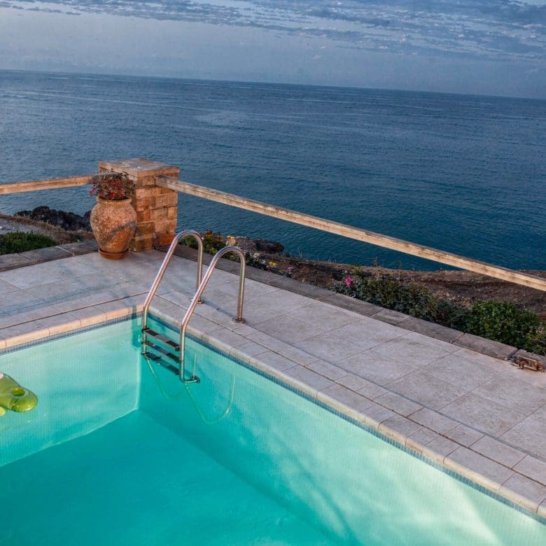 Poolside view with ladder and Aegean sea in Kea (Tzia)