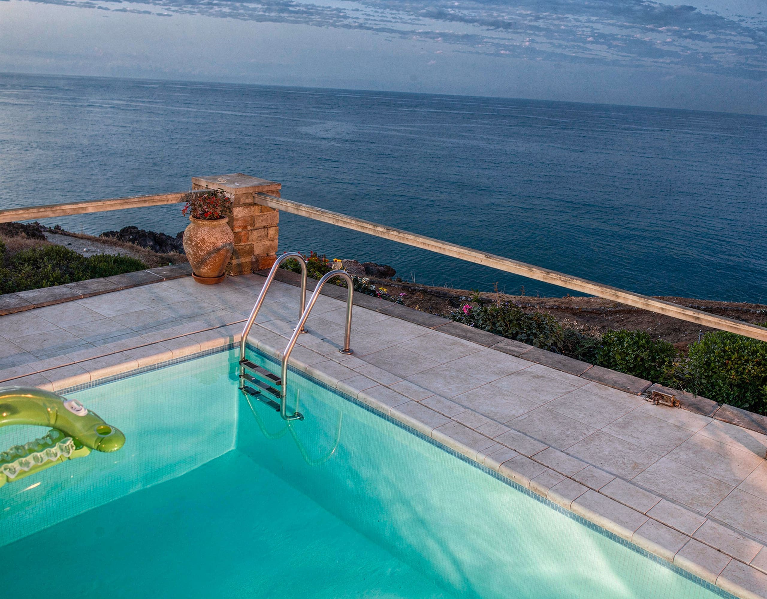 Poolside view with ladder and Aegean sea in Kea (Tzia)