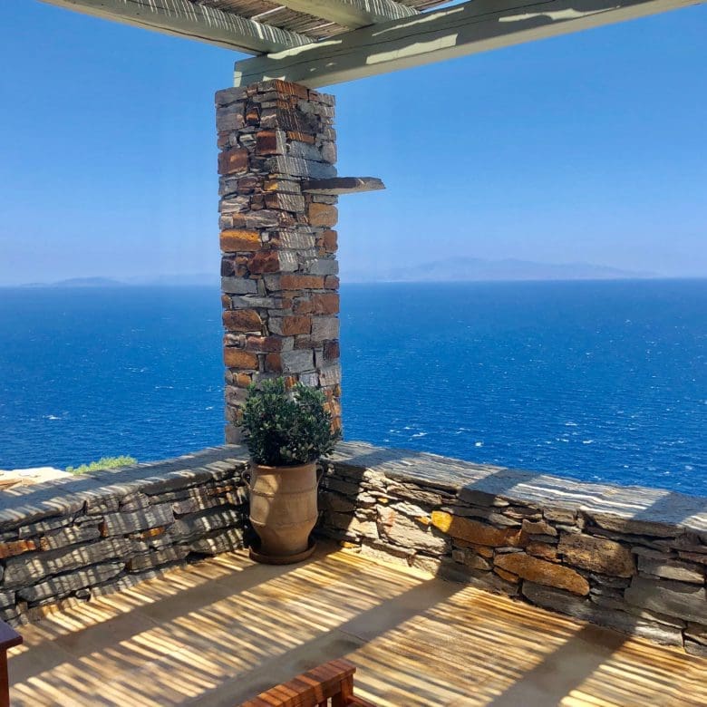 Open terrace with stone pillar and Aegean view in Kea (Tzia)
