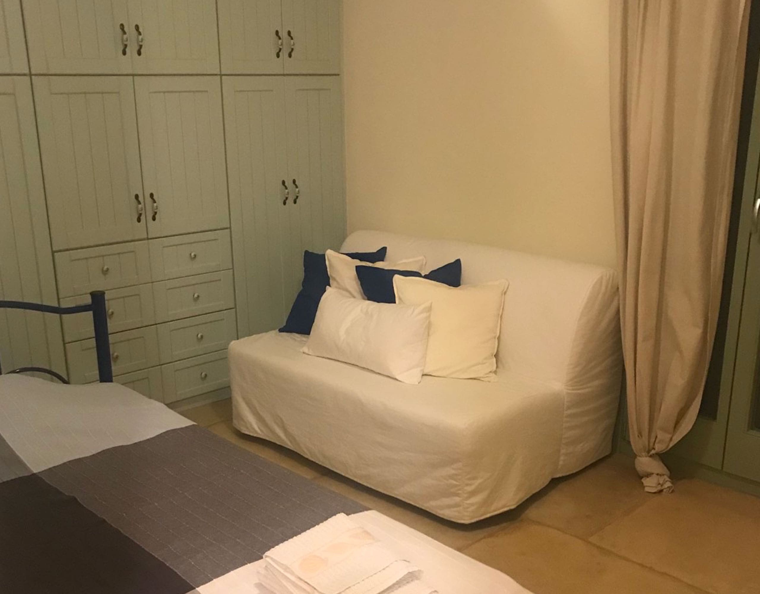 Guest bedroom interior in Kea (Tzia) maisonette