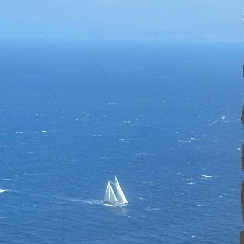 Poolside view with sun reflection over the sea in Kea (Tzia)