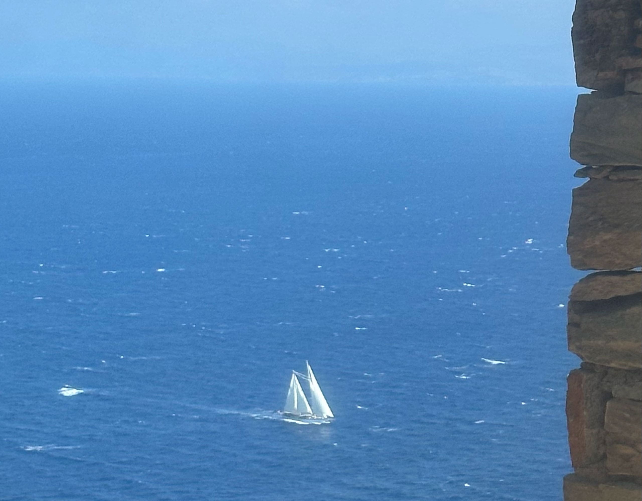 Poolside view with sun reflection over the sea in Kea (Tzia)